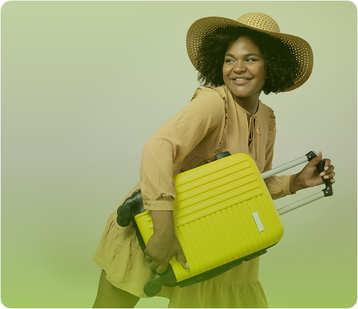 Smiling woman with suitcase in travel outfit